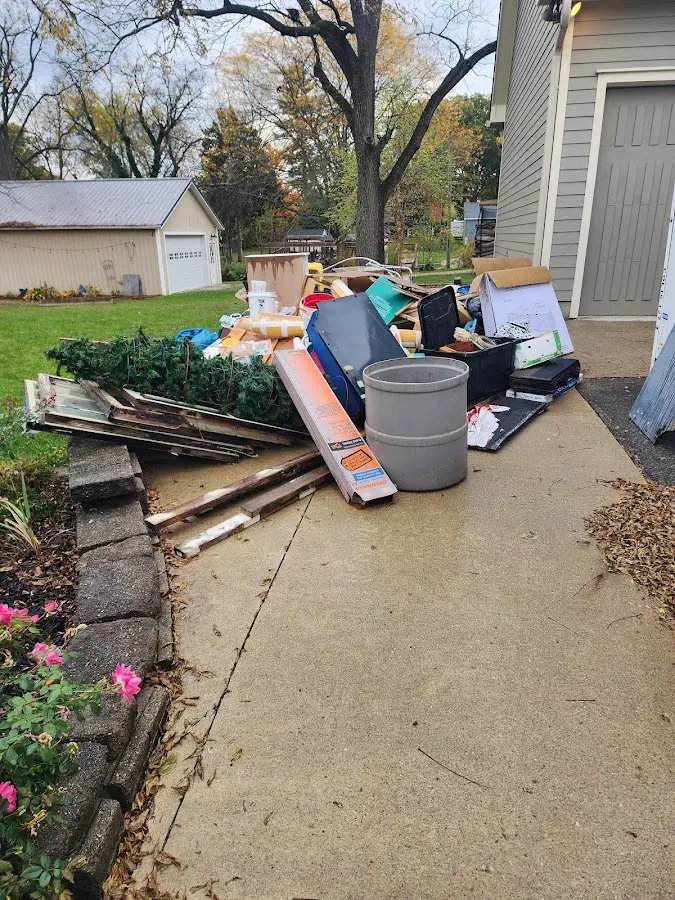 Dumpster being loaded with debris for 30 Yard Dumpster Rental in Solvang